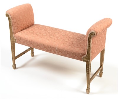 Lot 1261 - A George III style gold painted and upholstered window seat