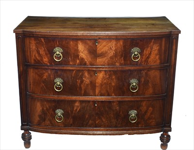 Lot 1214 - A George III bowfront chest of drawers.