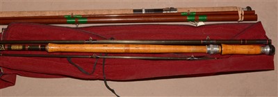 Lot 1617 - Two fishing rods and a slip.