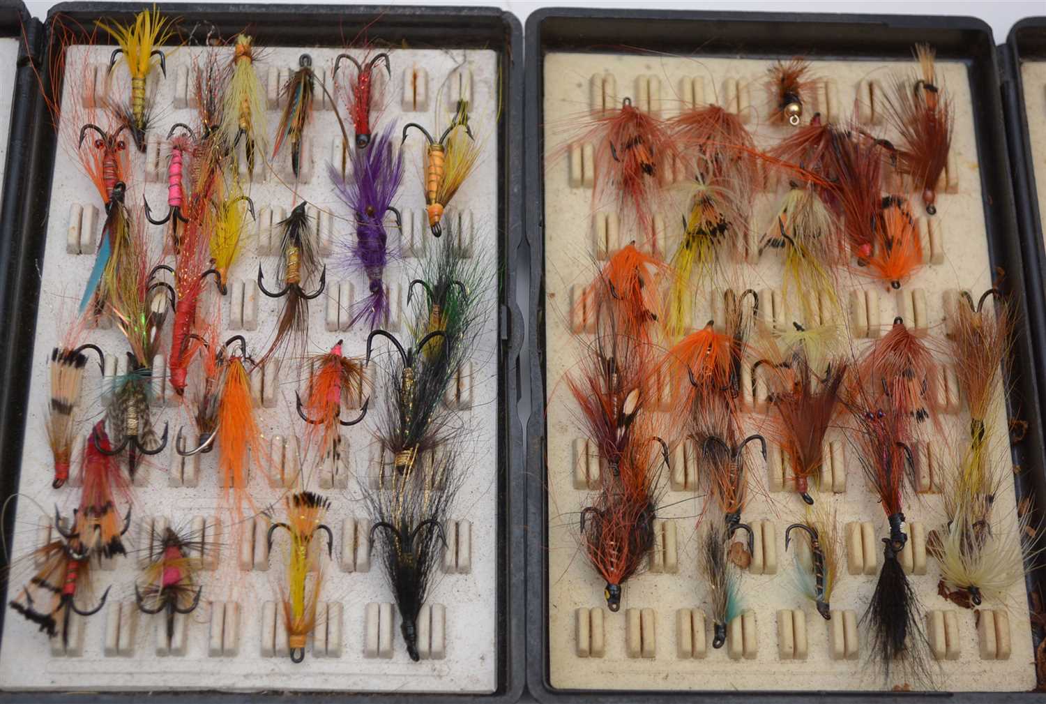 Lot 1602 - Two black plastic Fox Box fly cases containing salmon and sea trout flies.