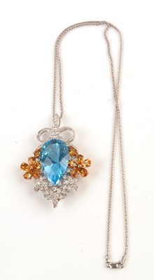 Lot 144 - Topaz and diamond pendant