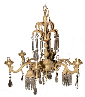 Lot 1021 - An ornate giltmetal and cut glass six light chandelier