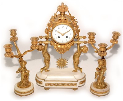 Lot 981 - G. Megnin: a French three-piece clock garniture.