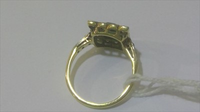 Lot 64 - Emerald and diamond ring