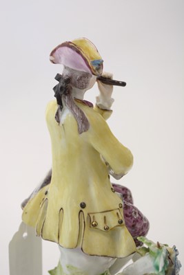 Lot 445 - Bow figure of a musician