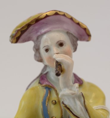 Lot 508 - Bow figure of a musician