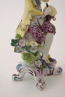 Lot 445 - Bow figure of a musician