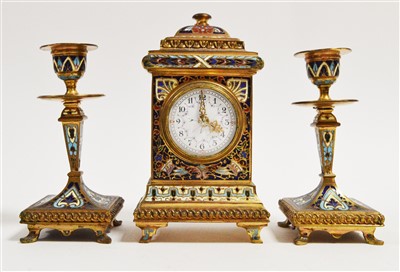 Lot 994 - A French ormolu and champleve clock garniture