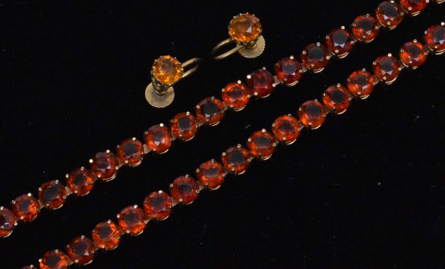 Lot 169 - Two citrine bracelets and a pair of earrings