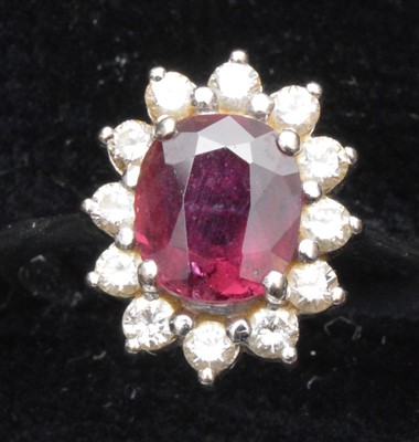 Lot 84 - Ruby and diamond ring