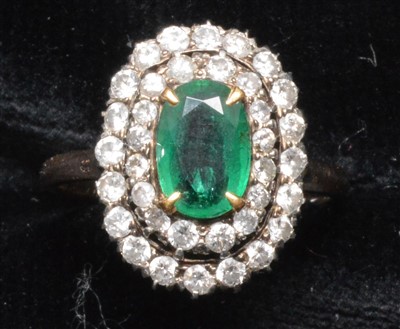 Lot 65 - Emerald and diamond cluster ring