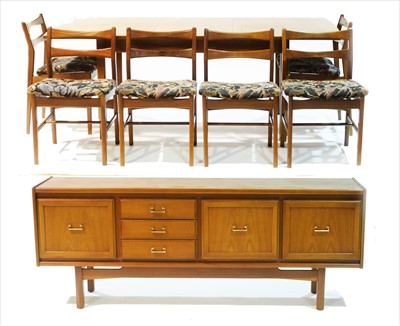 Lot 963 - A mid 20th Century teak eight-piece dining room suite