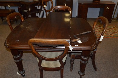Lot 525 - A Victorian rectangular mahogany extending dining table and five balloon back chairs.