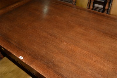 Lot 1157 - A reproduction oak draw leaf refectory style dining table