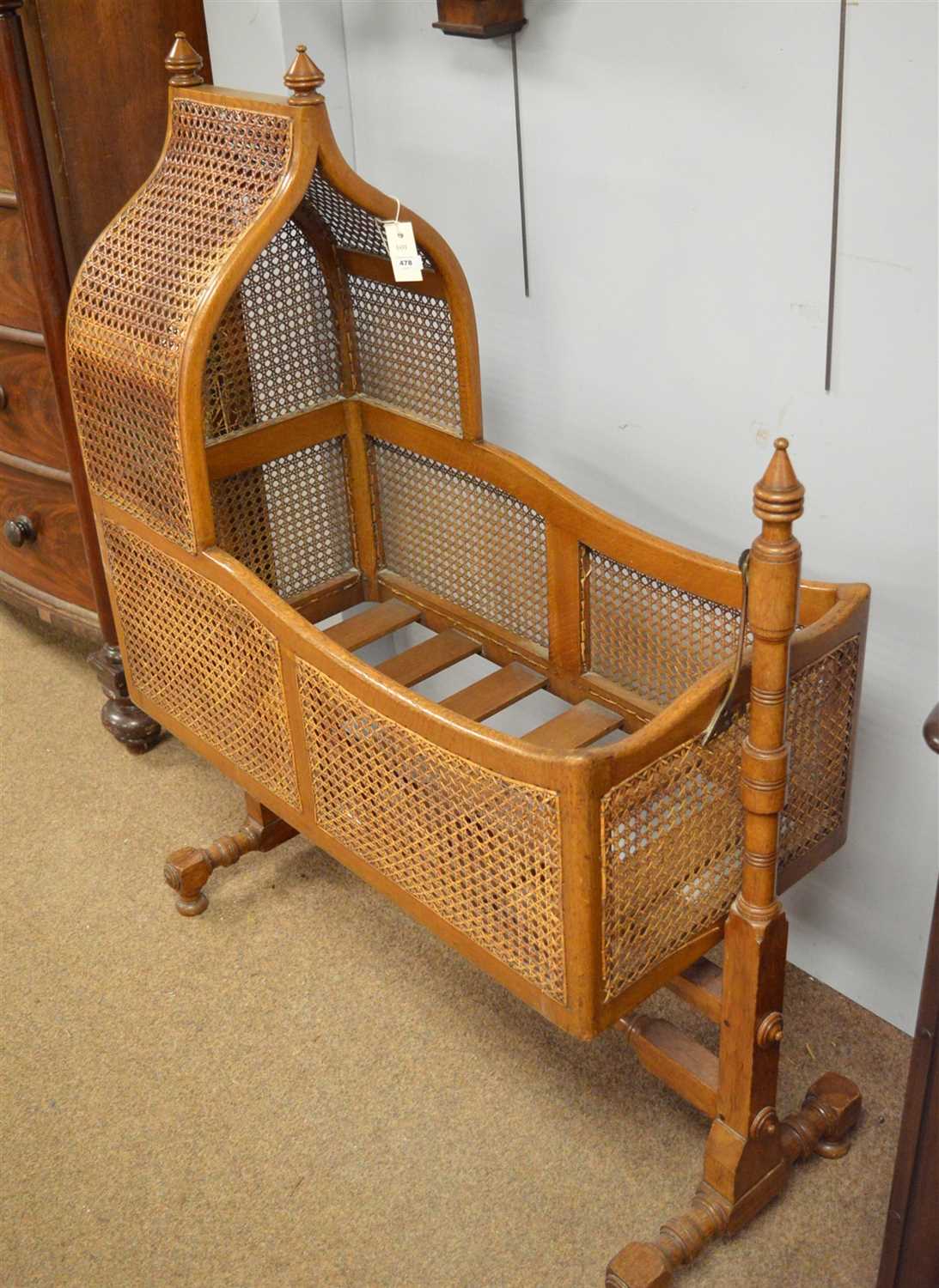 Lot 478 - An infant's oak cradle.