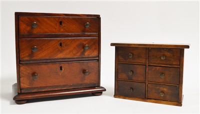 Lot 1088 - Two miniature chest of drawers