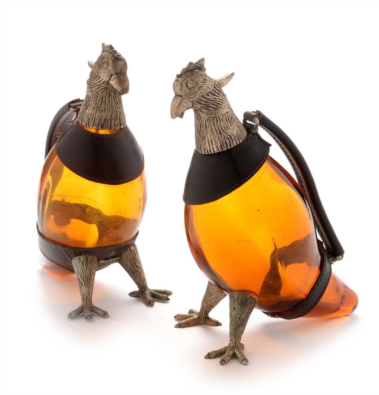 Lot 628 - Pair of continental parrot wine jugs