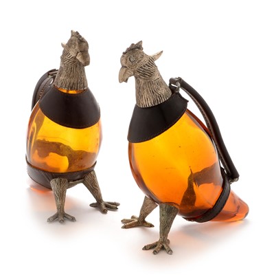 Lot 628 - Pair of continental parrot wine jugs