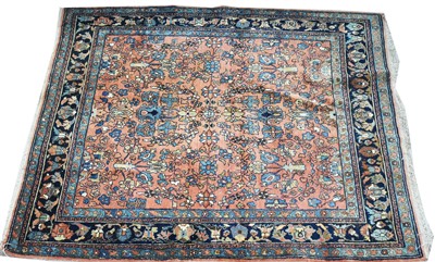 Lot 810 - Qum rug, with floral design on red ground, 200...