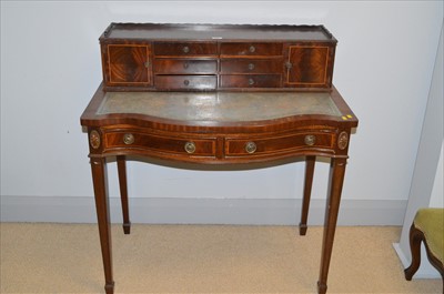 Lot 624 - Reproduction carved and house style writing table/desk