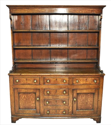 Lot 1225 - A Georgian oak dresser