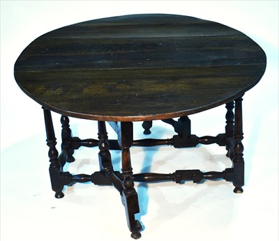 Lot 1200 - An 18th Century oak gateleg table