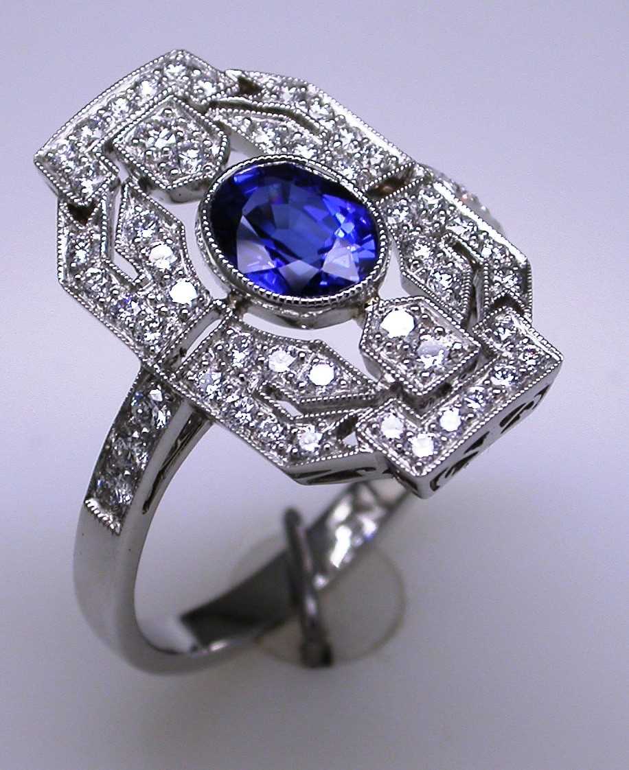 Lot 182 - Sapphire and diamond dress ring