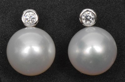 Lot 225 - Pearl and diamond earrings