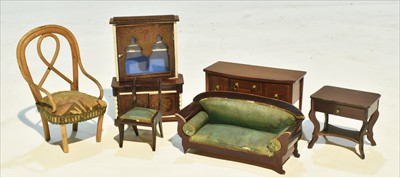 Lot 1032 - Miniature doll's house furniture and furnish; and a miniature doll.