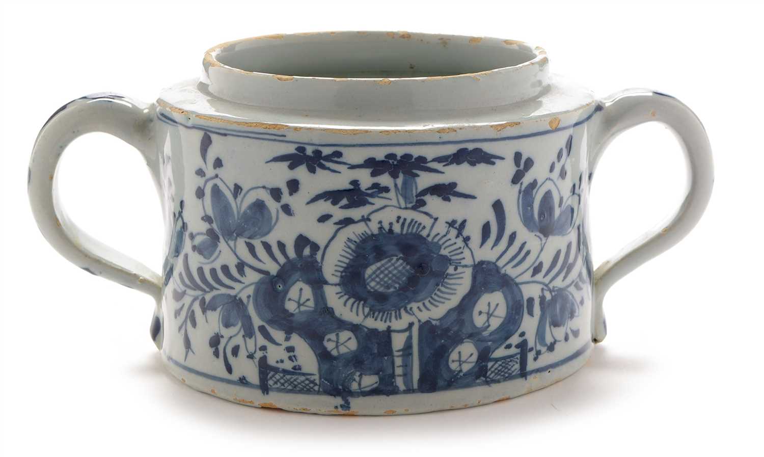 Lot 513 - A blue and white Delftware caudle cup.