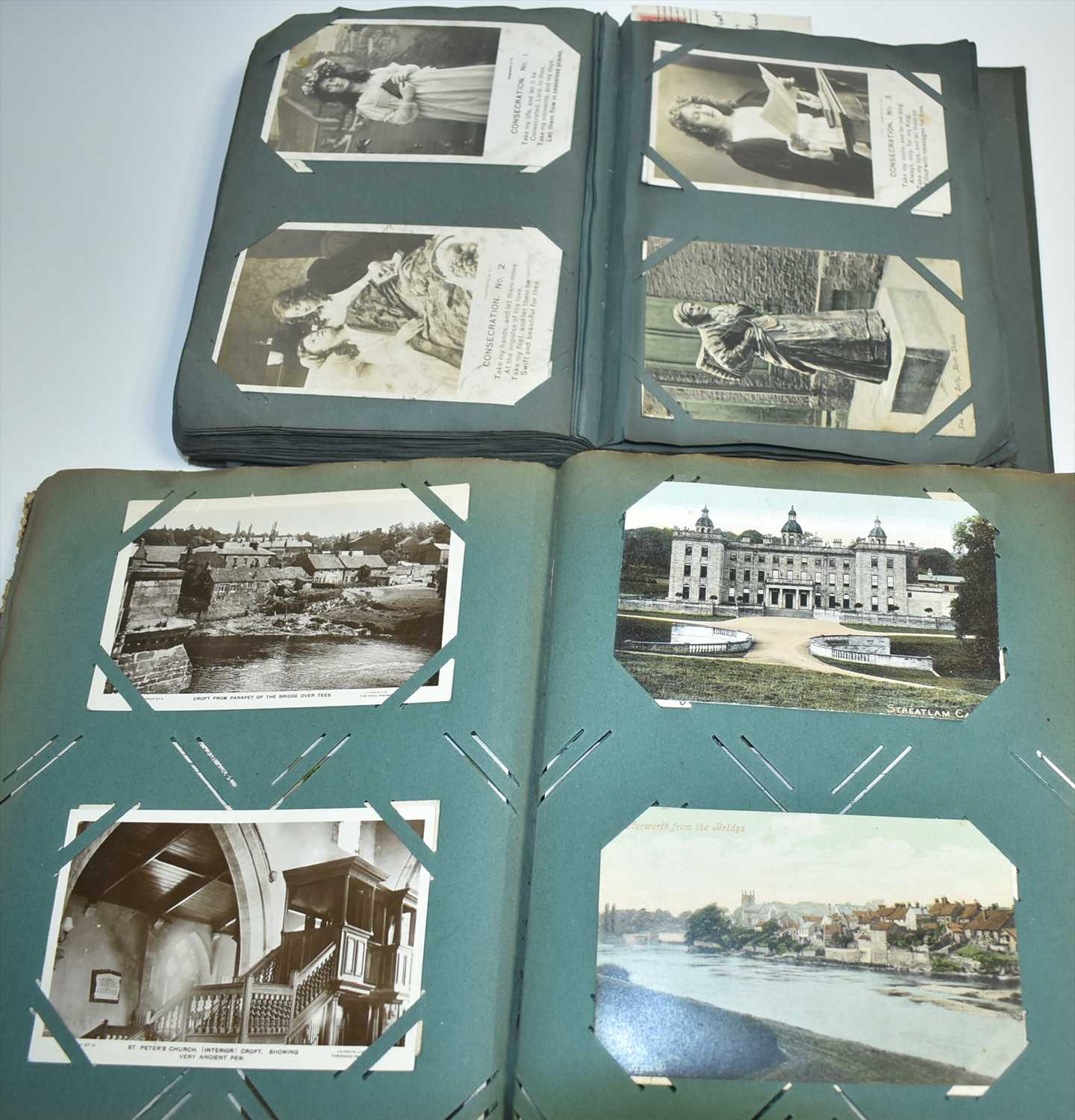 Lot 1150 - Two albums of postcards