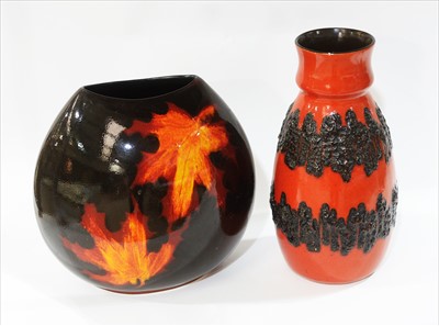 Lot 911 - Poole pottery Forest Flame purse vase,  and another