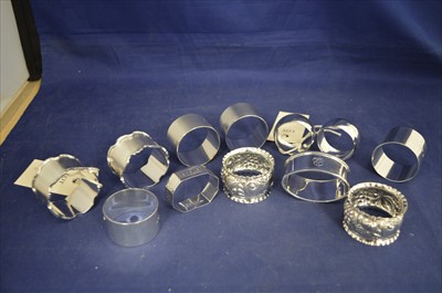 Lot 247 - Twelve silver napkin rings