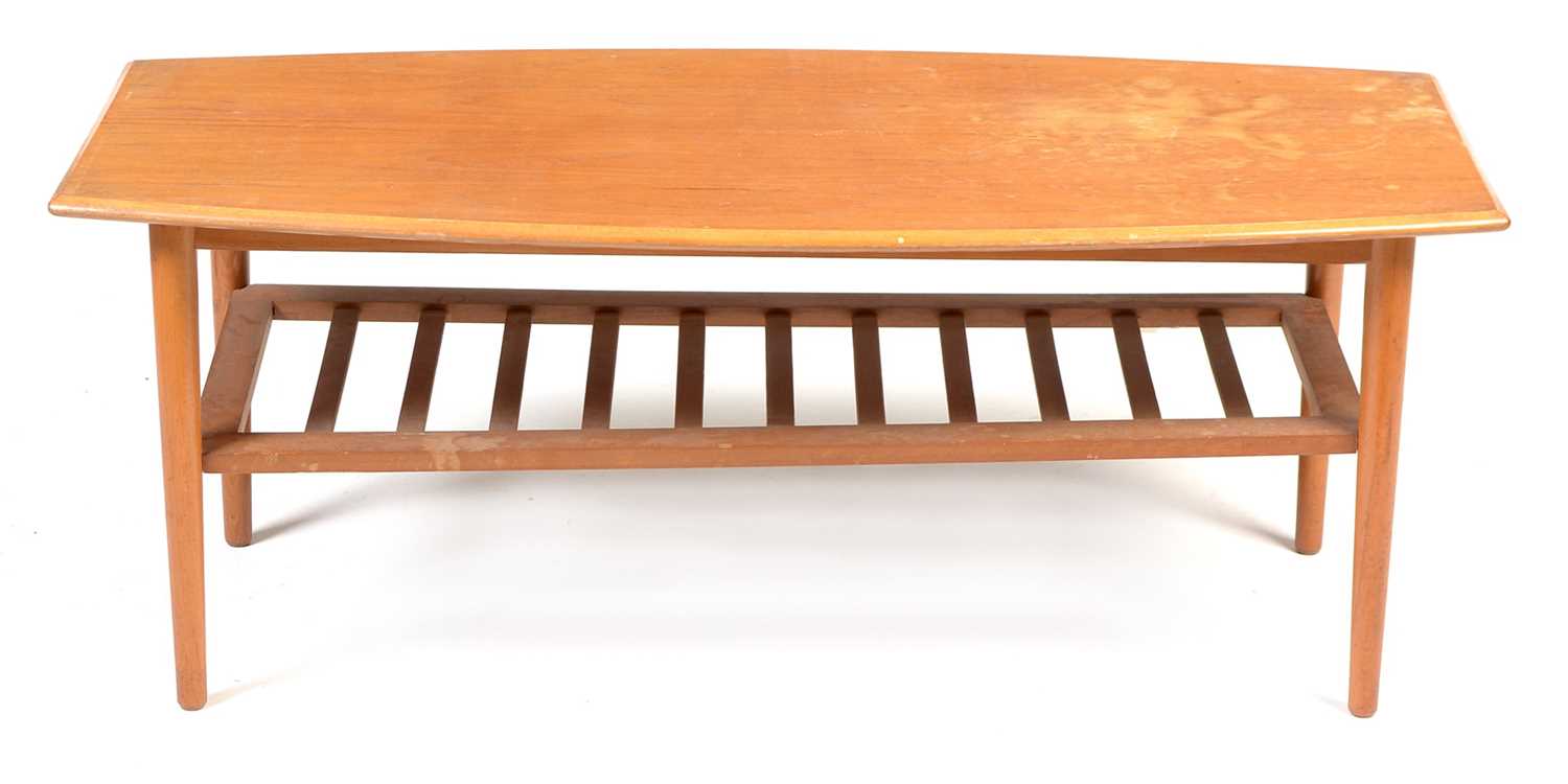 Lot 1165 - A mid 20th Century teak and beech coffee table.