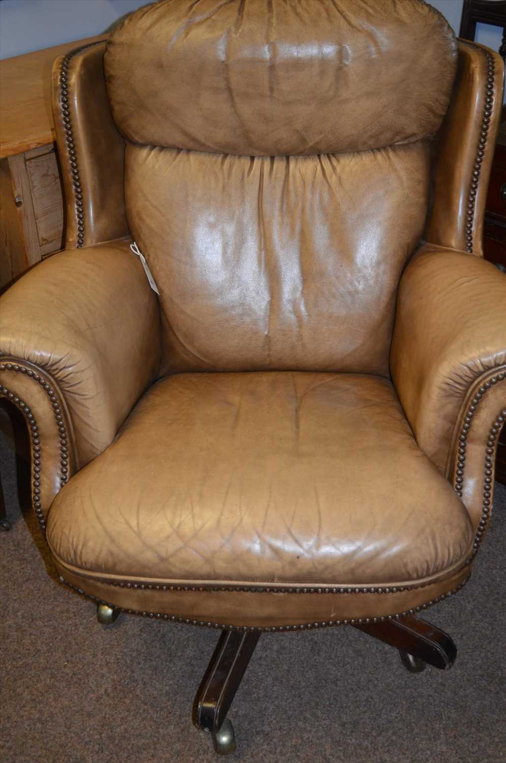 Lot 831 - Tan leather office chair.