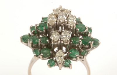 Lot 226 - Emerald and diamond dress ring