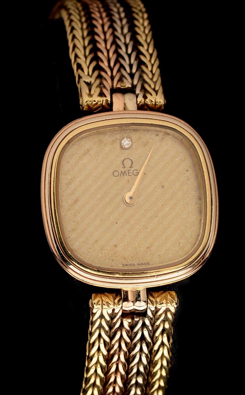 Lot 17 - Omega 18ct gold cocktail watch