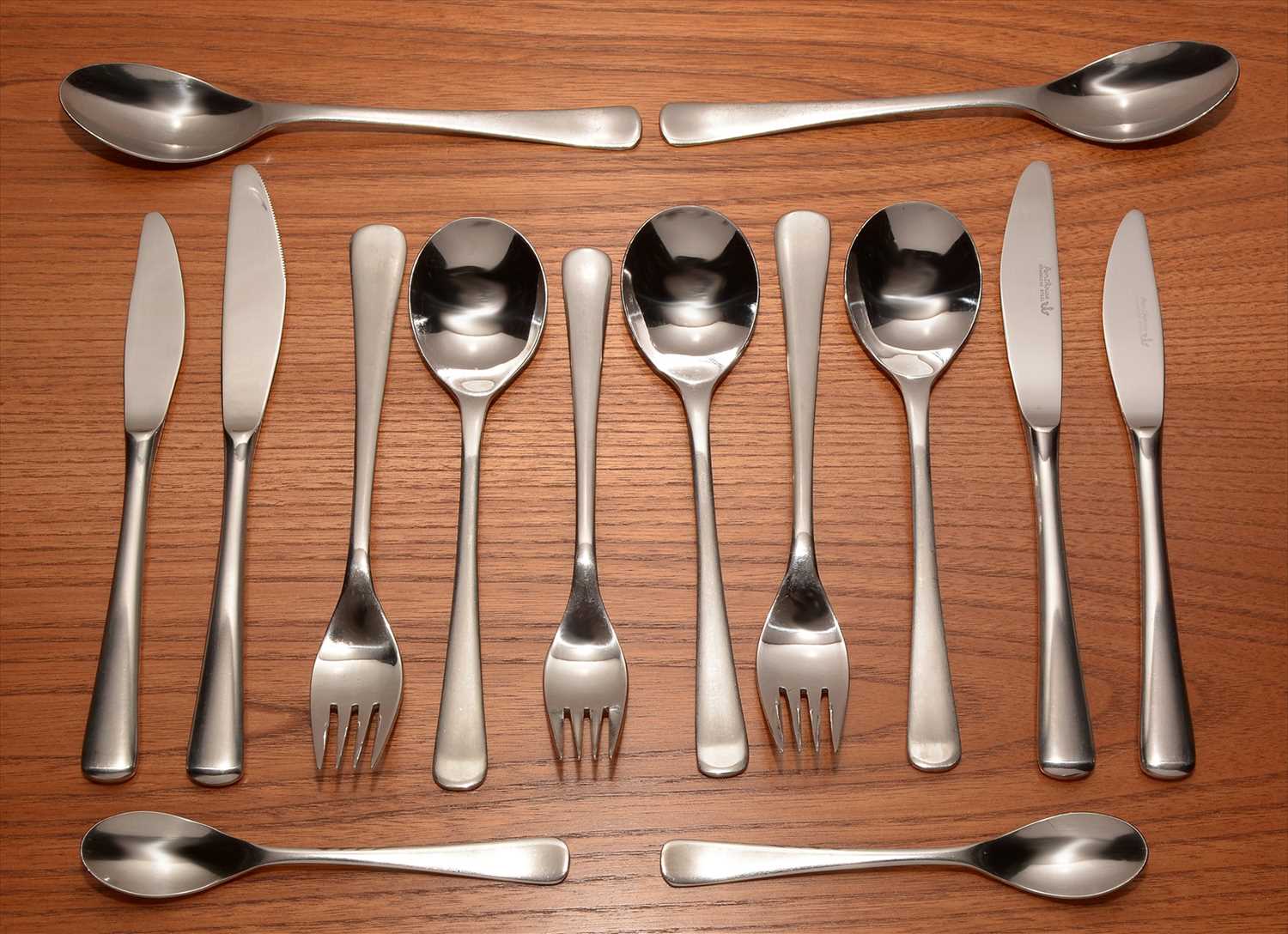 Lot 919 - A part Herbert Housley Penthouse stainless steel cutlery set.