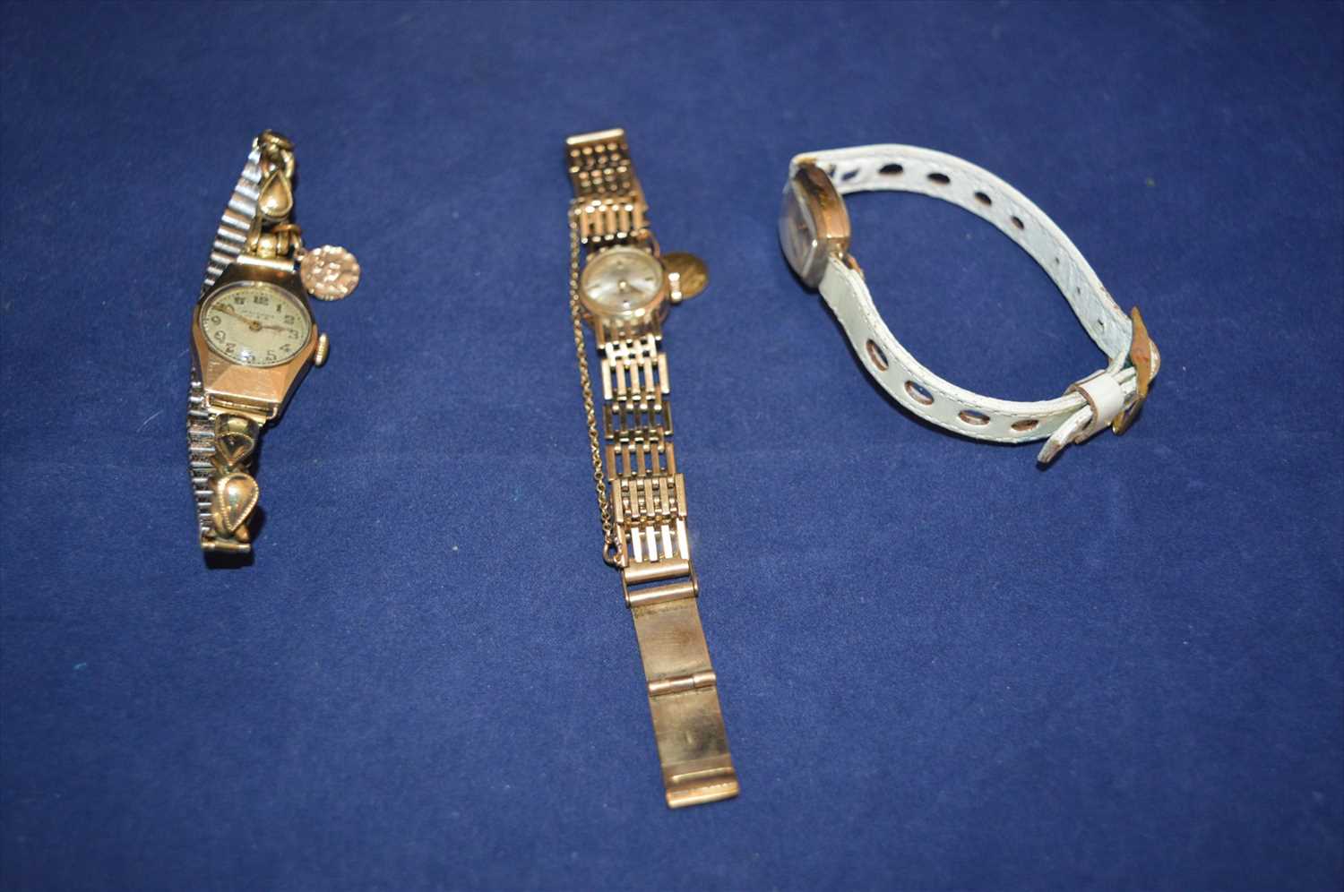 Lot 9 - Three gold cased watches
