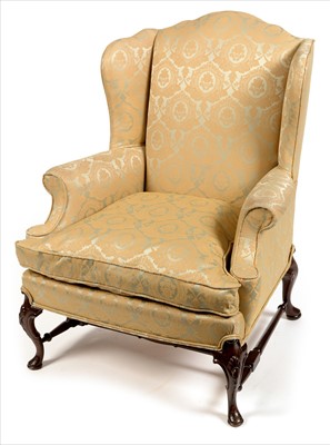 Lot 1171 - George II style wing-back armchair