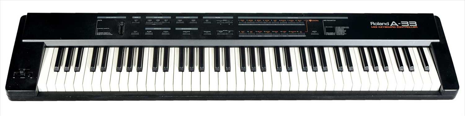 Lot 26 - A Roland A33 Keyboard and stand