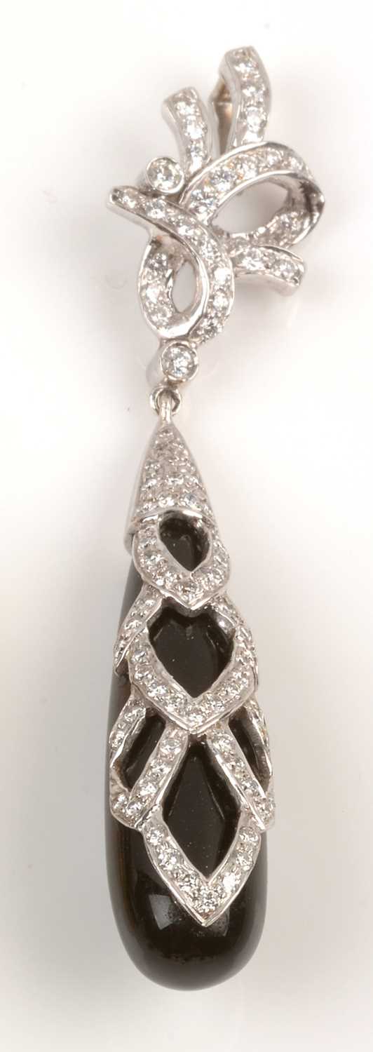 Lot 150 - Diamond set onyx pendant