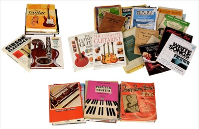 Lot 91 - Three boxes of guitar related books and music