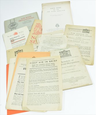 Lot 1207 - WWII military booklets and glass negatives