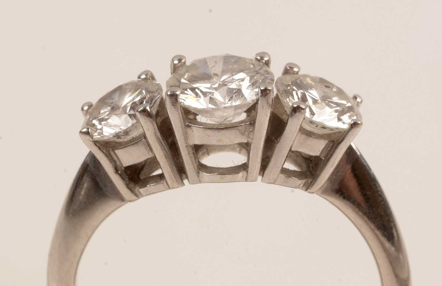 Lot 53 - A three stone diamond ring