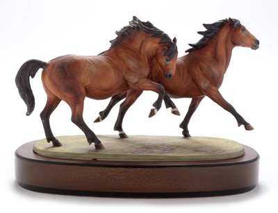 Lot 483 - Royal Worcester figure galloping ponies