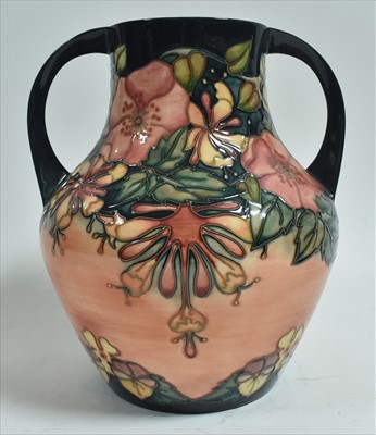 Lot 606 - Moorcroft two handled vase