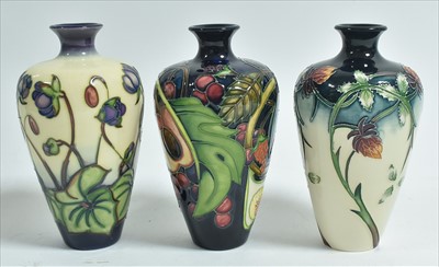 Lot 572 - Three Moorcroft vases