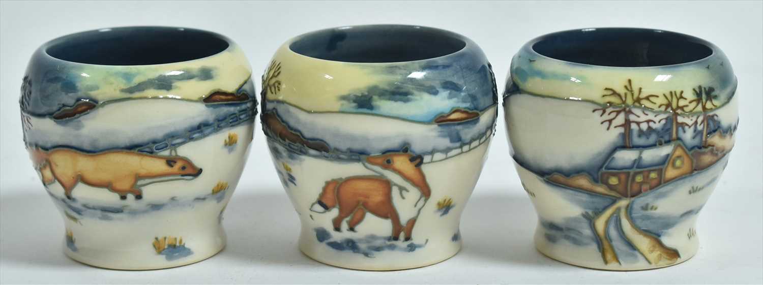 Lot 578 - Three Moorcroft egg cups