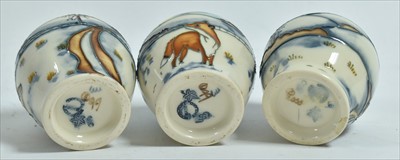 Lot 578 - Three Moorcroft egg cups